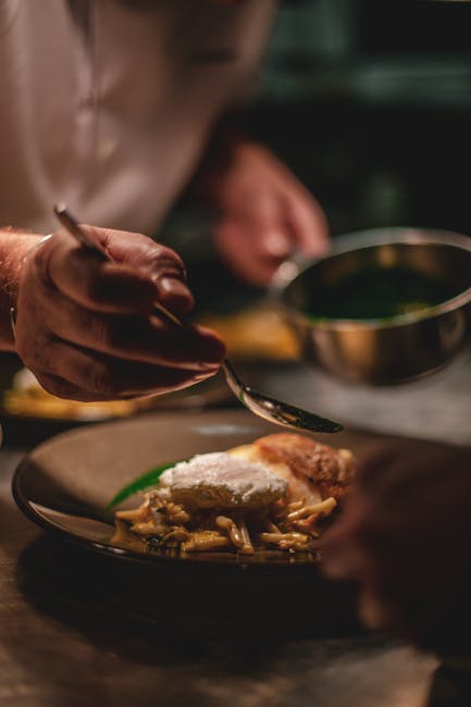 Chef cuisinier dans son restaurant - Créez un site web sur mesure pour promouvoir vos services
