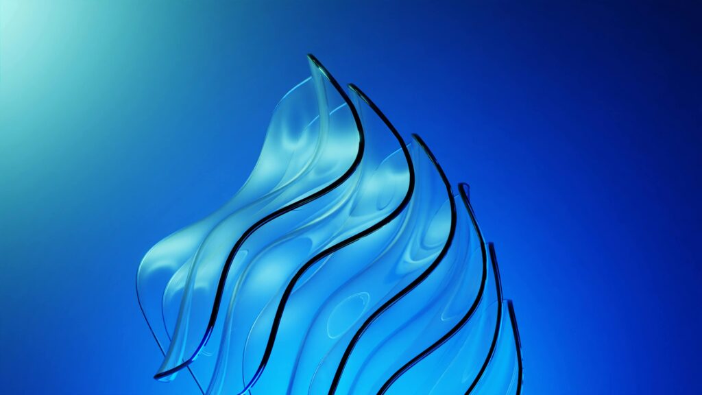 Artistic abstract render featuring blue curving glass shapes on a blue background.